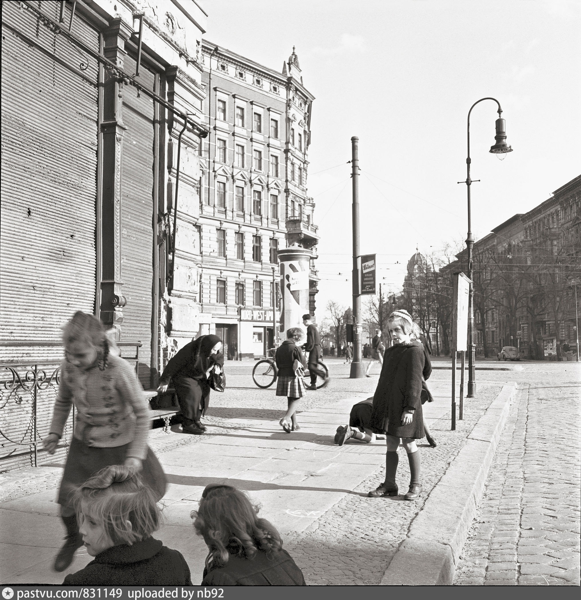 Children playing on the street at the Rathenower Straße, at the corner ...