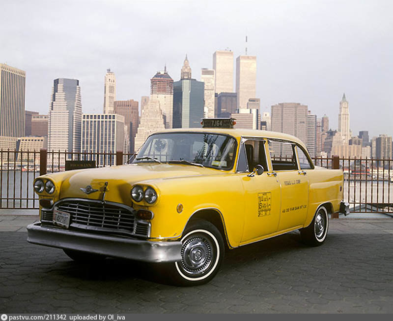 1996 Taxi, Manhattan in the background.
