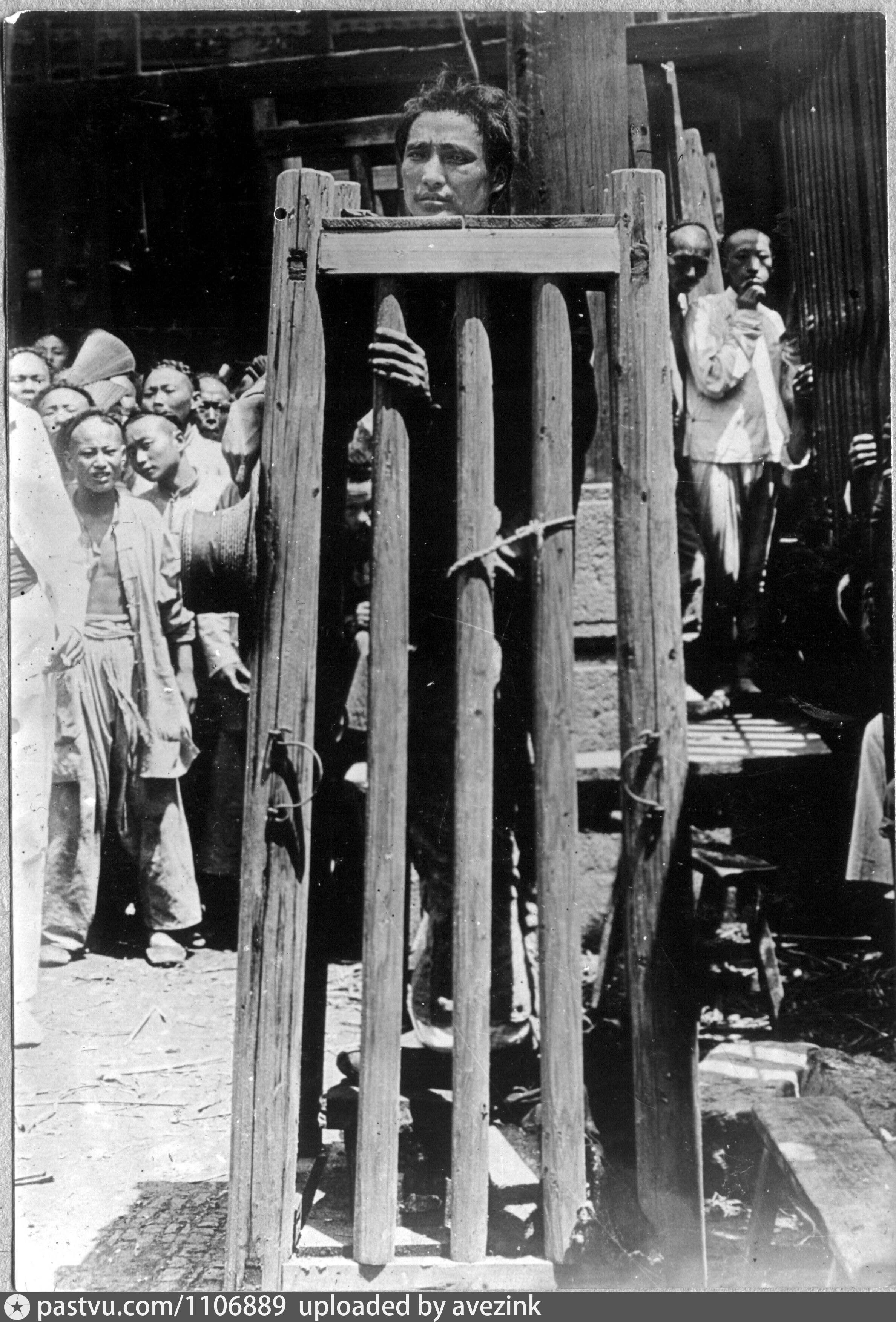 Prisoner in a torture device