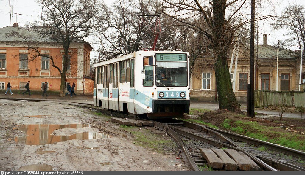 Старые троллейбусы в таганроге. Таганрогу 2000 лет. Таганрог вывеска города. Таганрог трамвай 5. Таганрог название.