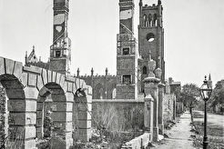 Broad Street, looking east with the ruins of Cathedral of St. John and St. Finbar (1861)
