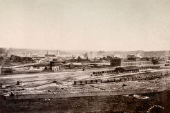 Панорама города и железнодорожный вокзал с Нового Света (Науйининкай) (1865)