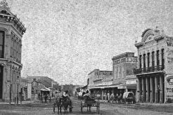 Gallagher building. View is south on Alamo Plaza from the North side of the Blum street intersection (1879)