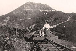 Woman with milk cans on the West Peak radio Station Incline (1900)